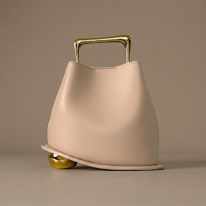 Sophisticated PU leather bucket bag in various colors like brown & orange, an elegant women's accessory.