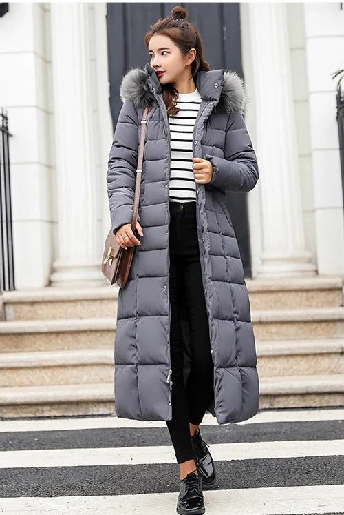 Elegant women's puffer jacket with zip closure, warm & stylish for winter. Perfect cold weather outerwear.