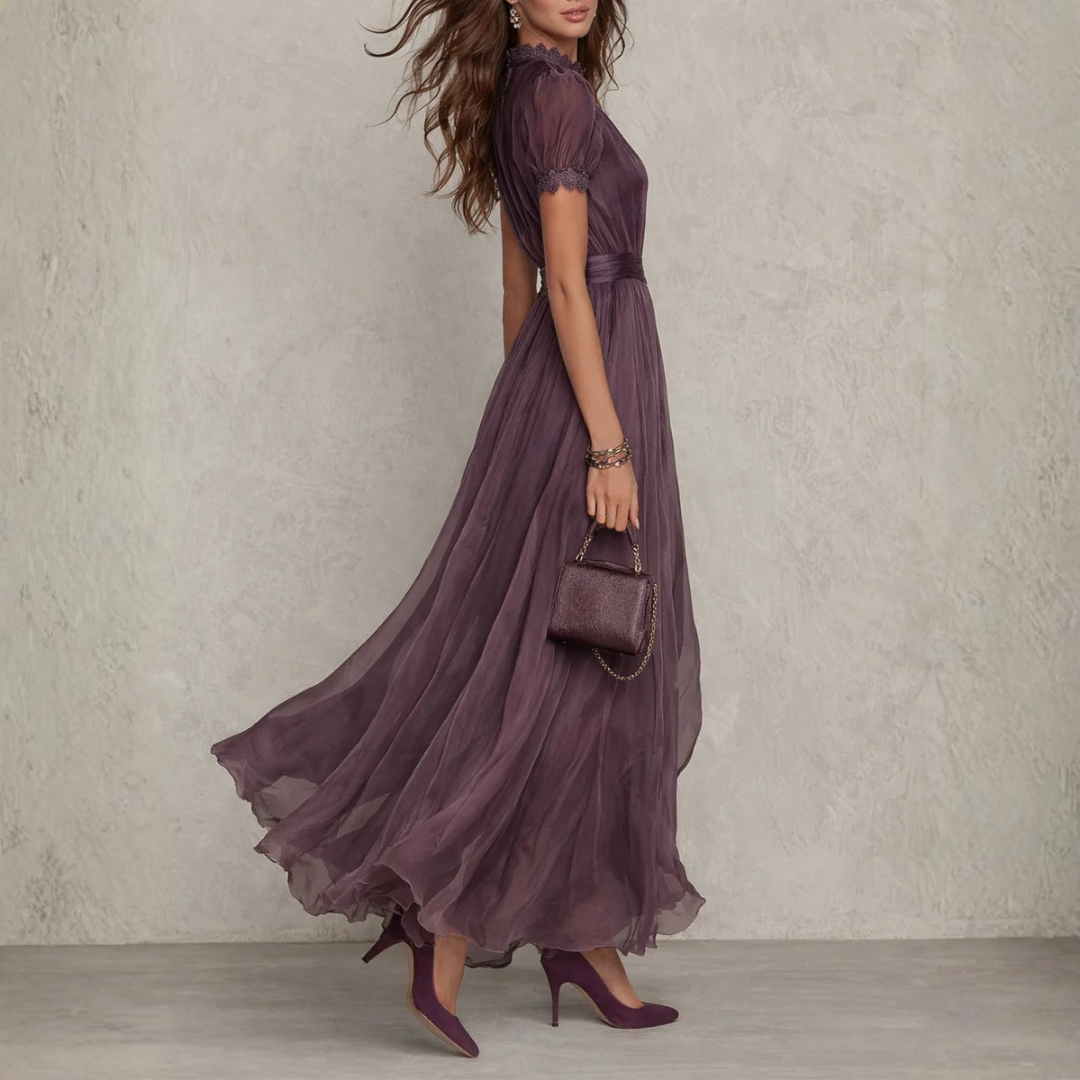 Sophisticated women's long purple dress, an elegant maxi gown with delicate lace trim and high neckline.