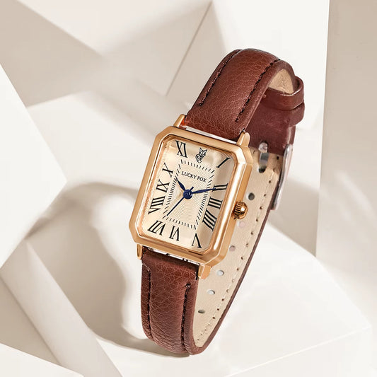 Elegant women's rectangle quartz watch with black leather strap and gold-tone case.