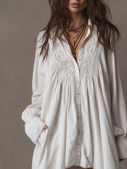 Vintage-inspired women's long-sleeve dress with an elegant irregular hem, for a refined retro look.