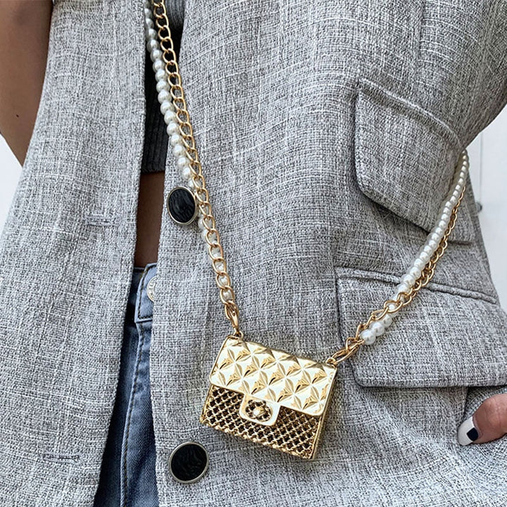 Silver rhinestone mini evening bag, elegant women's clutch accessory with metallic sparkle.
