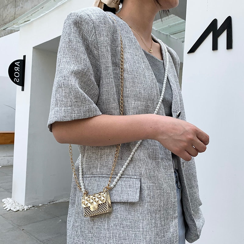 Gold rhinestone mini purse, women's elegant party clutch with metallic shimmer.