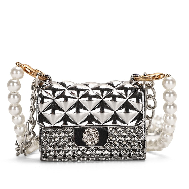 Elegant women's mini evening bag, a sparkly rhinestone clutch accessory for parties.