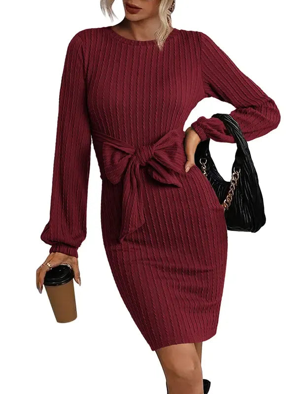 Stylish women's elegant midi dress featuring a ribbed texture, long sleeves & flattering waist tie. Classic daily wear.