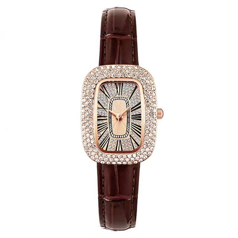 Refined women's rose gold rectangular watch, sparkling crystals, comfortable leather strap.