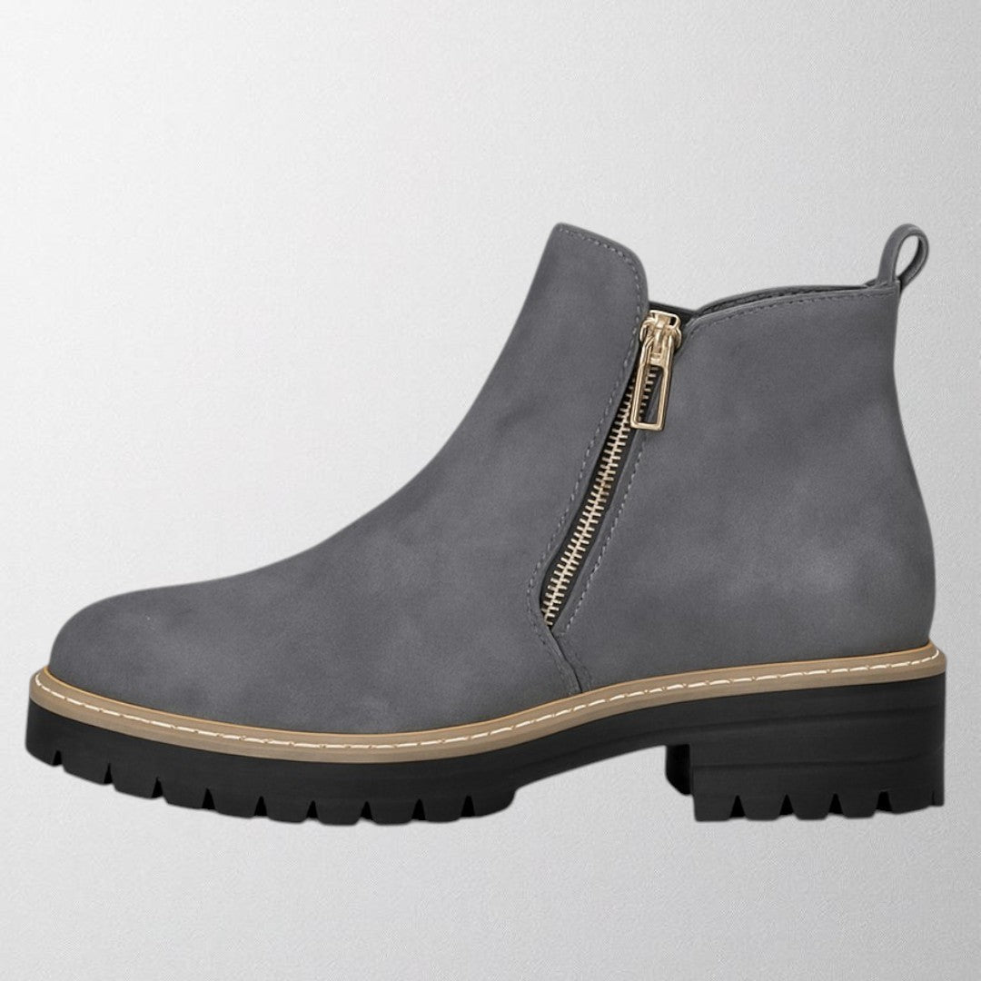 Sleek women's round toe side zip shoes, ideal for office and casual elegance. Comfortable and easy to slip on.