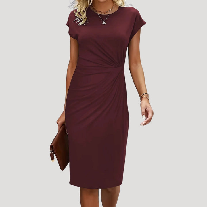 Stylish women's fitted ruched midi dress, with cap sleeves and a flattering silhouette for formal wear.