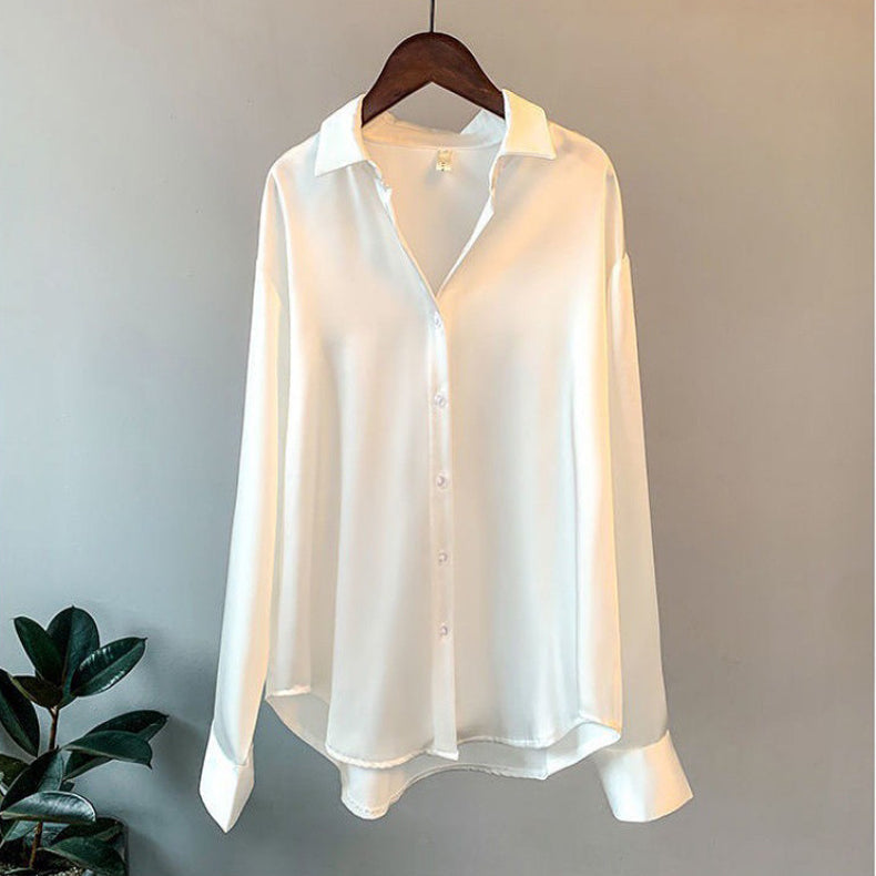 Elegant women's ruffle blouse, long sleeve. Perfect for sophisticated casual or workwear. Chic and versatile top.