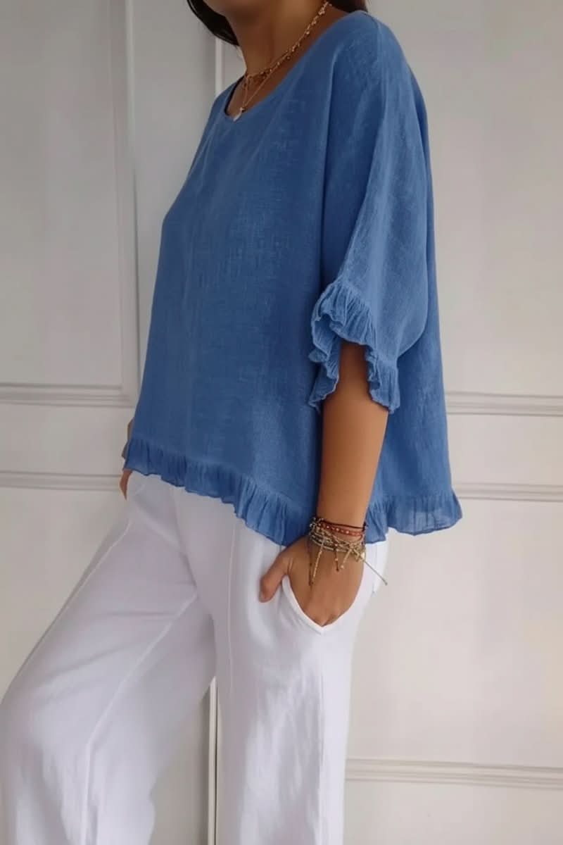 Chic women's ruffle top, lightweight & versatile for summer or work.