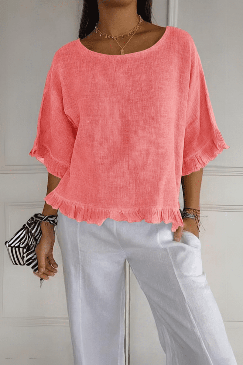 Stylish women's blouse with elegant ruffles, a chic top for any occasion.