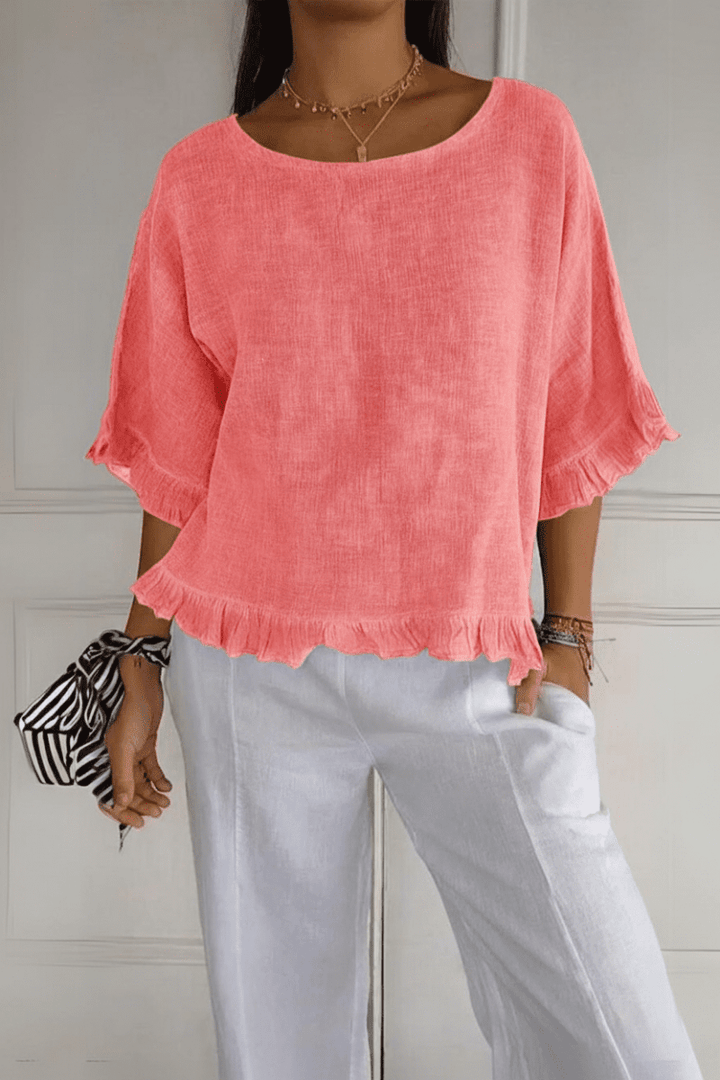 Stylish women's blouse with elegant ruffles, a chic top for any occasion.