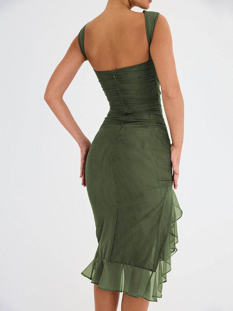 Women's elegant sleeveless midi dress with ruffle details, perfect for chic events.