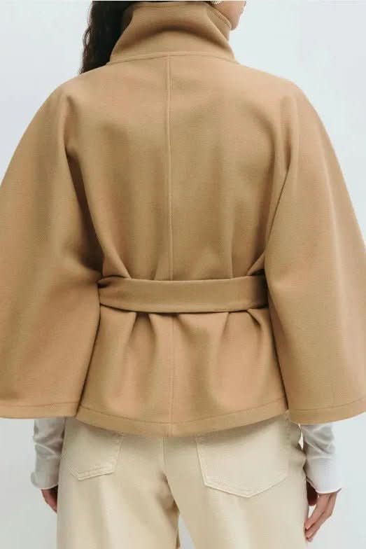Women's timeless self-tie cape, offering a cozy oversized fit for sophisticated fall outerwear.