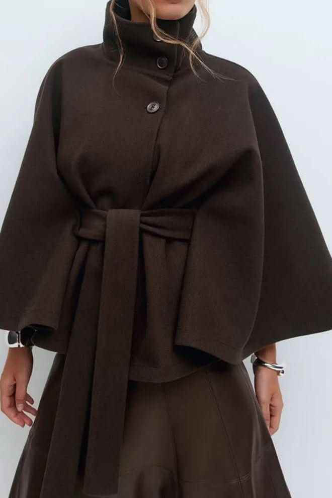 Stylish women's oversized self-tie cape, a cozy and elegant outerwear piece for cold weather.