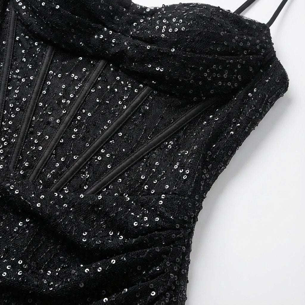 Elegant strapless sequin maxi dress with sweetheart neckline & high slit. Women's formal evening wear for parties.