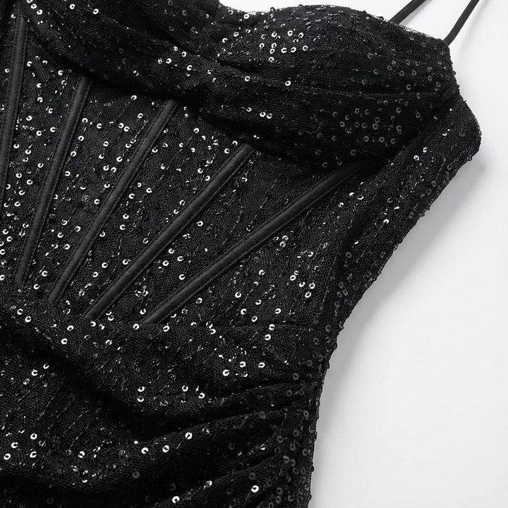 Elegant strapless sequin maxi dress with sweetheart neckline & high slit. Women's formal evening wear for parties.