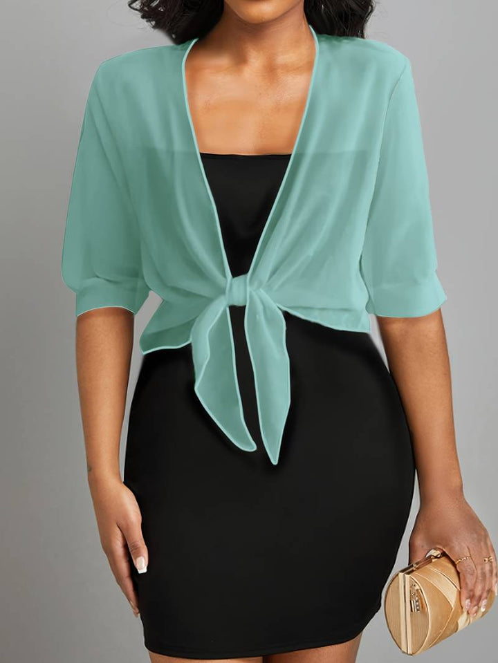 Stylish women's sheer tie-front cropped bolero, an elegant half-sleeve fashion layering top.