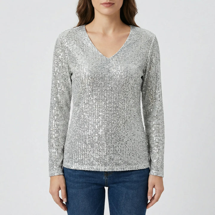 Fashionable women's shimmer V-neck long-sleeve top. A stylish and comfortable piece of womens apparel.