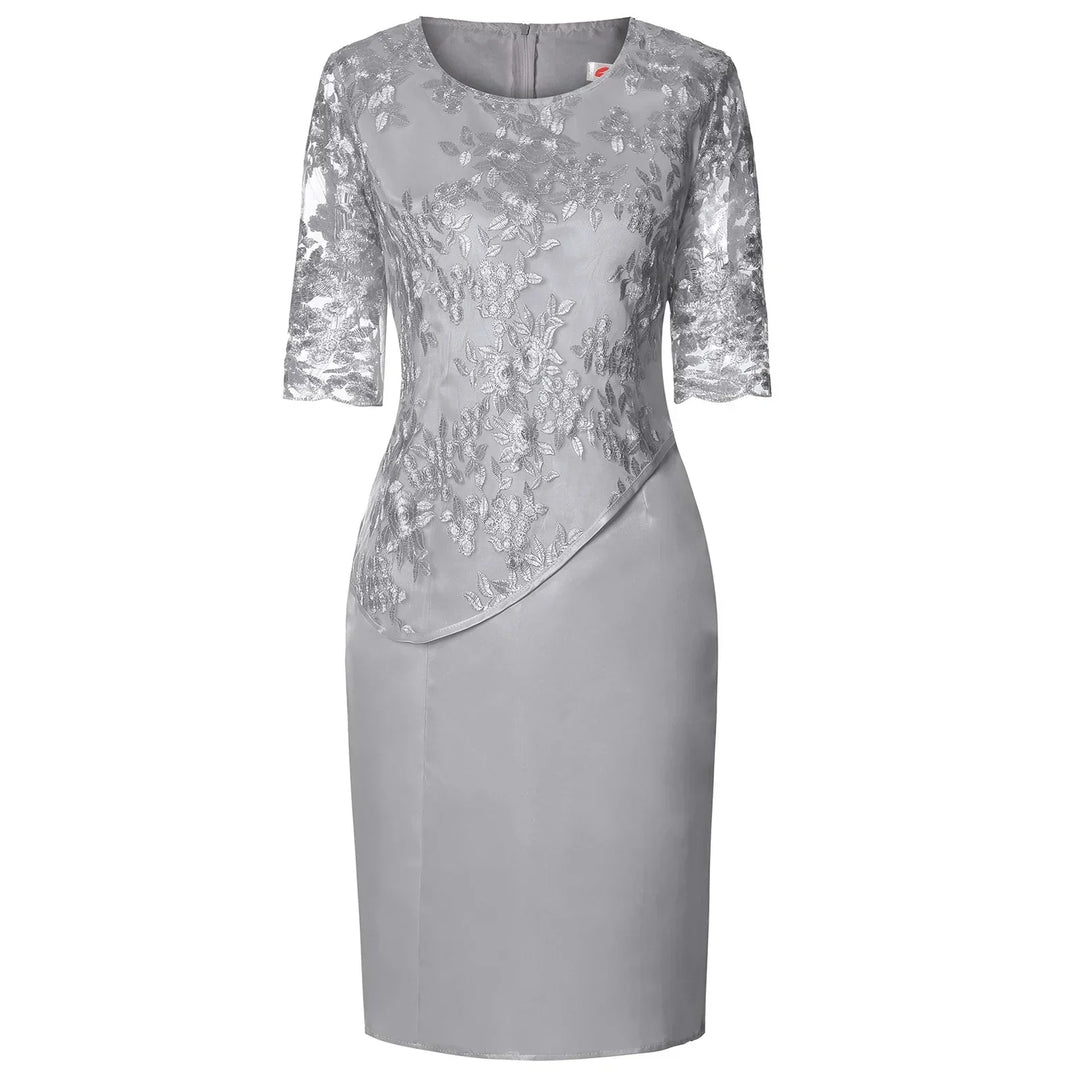Pink women's short sleeve midi dress, featuring a chic and flattering design for sophisticated fashion.