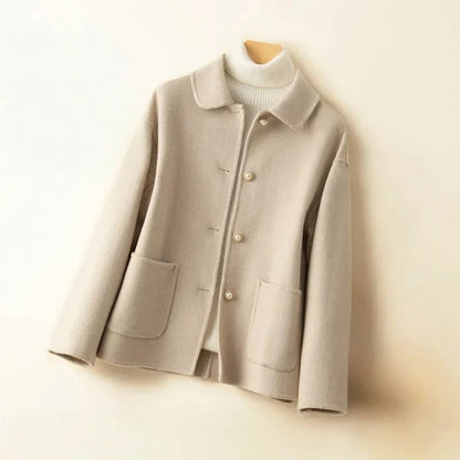 Mustard women's short winter coat. Stylish and warm outerwear for autumn and winter fashion.