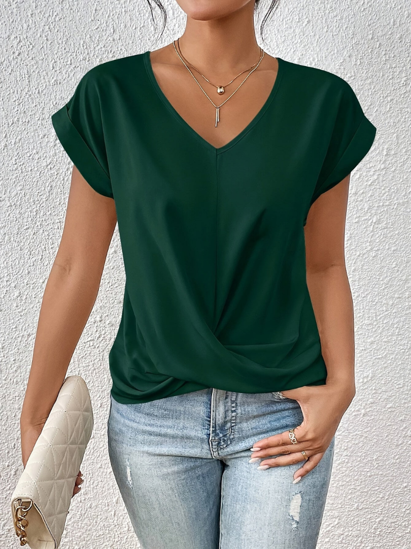 Casual chic women's blouse: Silky short sleeve top with a flattering V-neck and a unique twist-front detail.