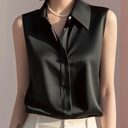 Chic sleeveless collared button blouse for women. Versatile tailored top, perfect for professional or smart casual outfits.
