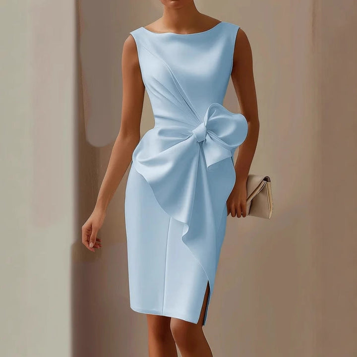 Asymmetrical sleeveless cocktail dress for women, featuring a stylish bow detail. Ideal for elegant party wear.