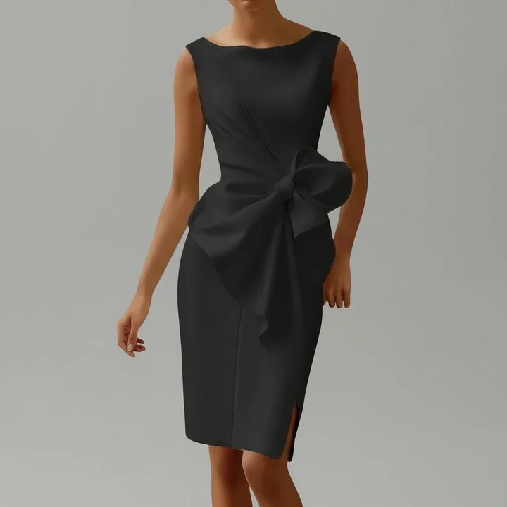 Stylish women's elegant sleeveless midi dress, perfect as a cocktail or party dress, featuring a chic bow detail.