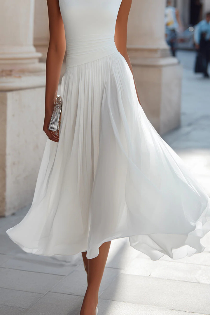 Beautiful women's sleeveless midi dress, designed with a flattering A-line cut and elegant flowing style.