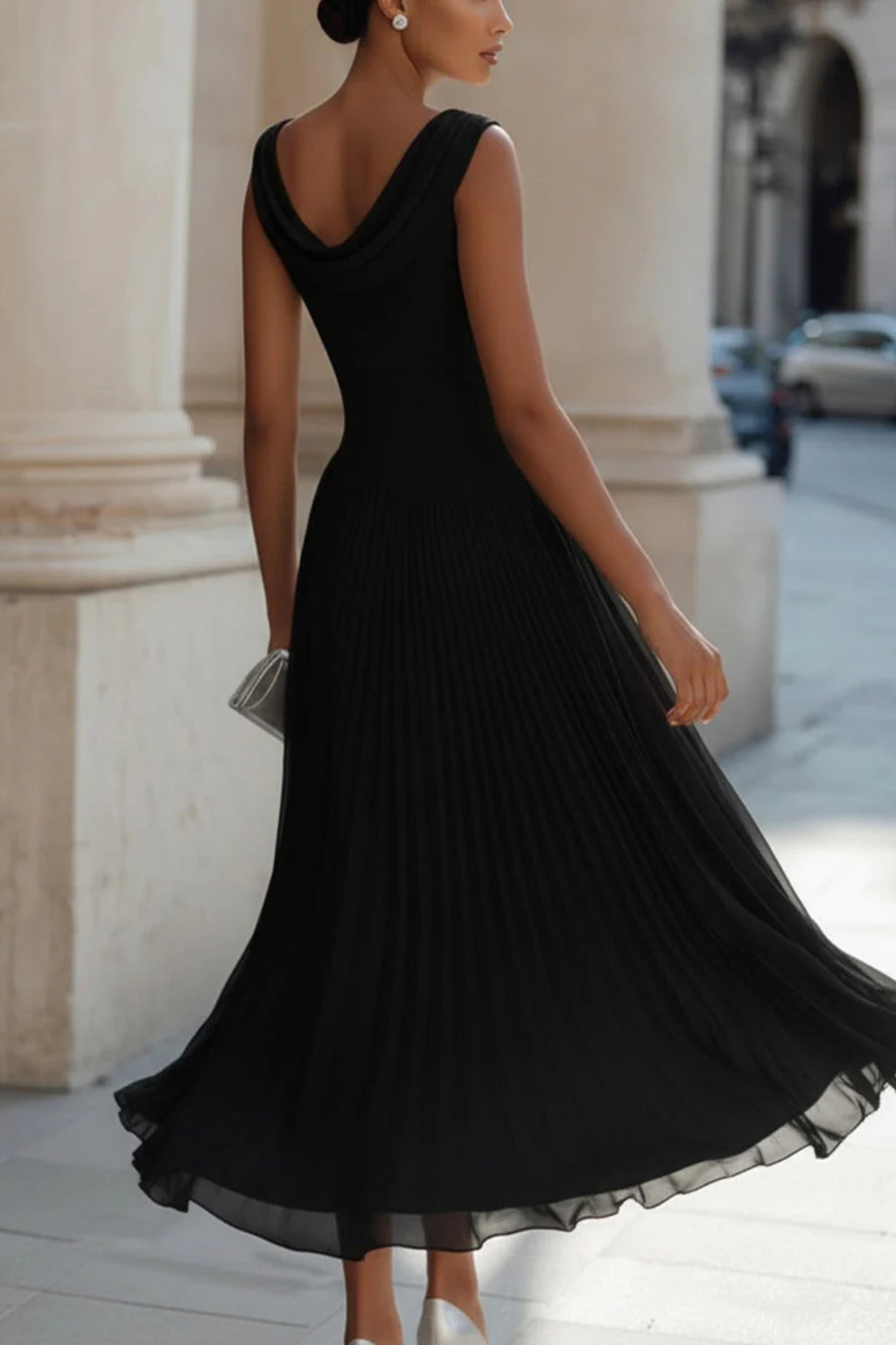 Stylish women's sleeveless flowing A-line midi dress, a comfortable yet formal choice for any special occasion.