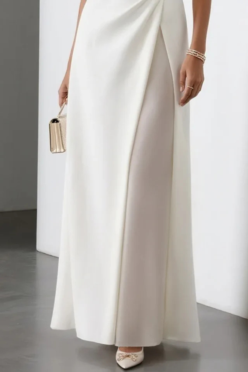 Graceful women's long party maxi dress featuring an elegant side slit and sleeveless design.