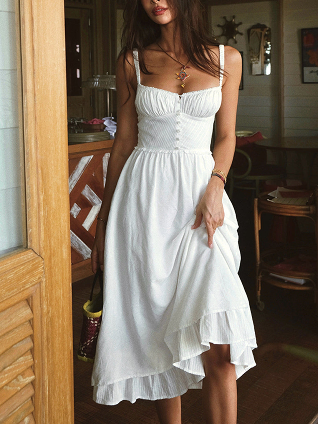 Stylish women's non-stretch sleeveless midi dress showcasing a beautiful ruffle hem.