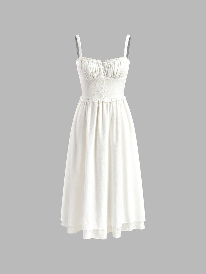 Women's elegant sleeveless midi dress with a lovely ruffle hem, great for spring & summer events.