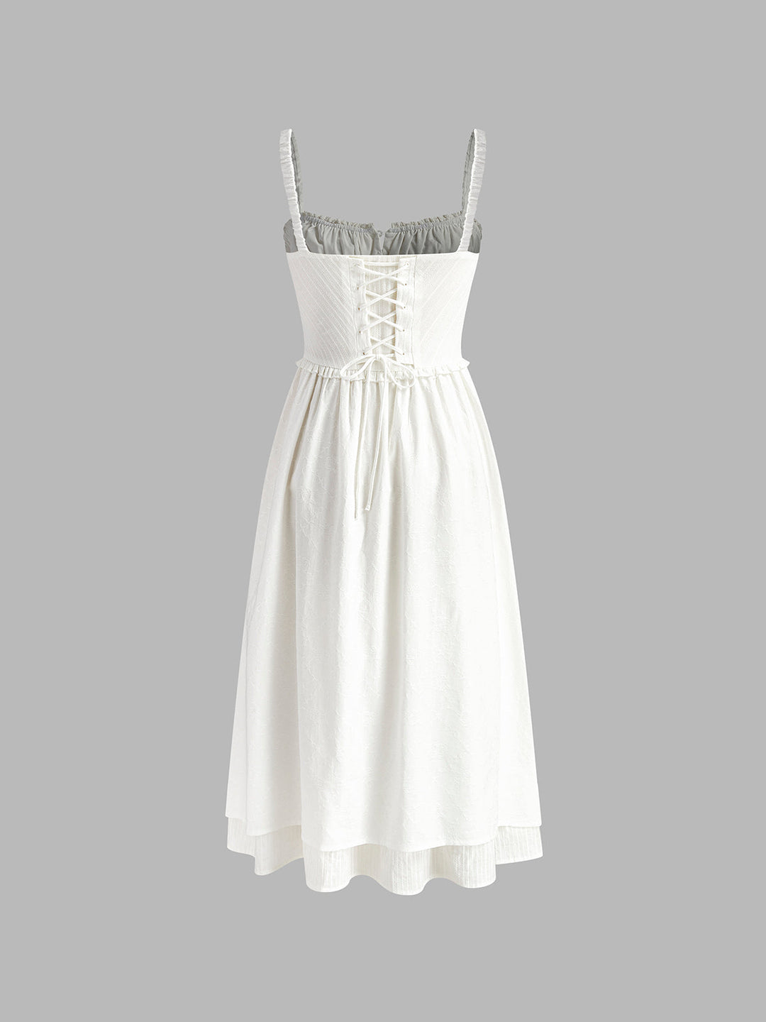 Sleeveless women's midi dress with a distinctive ruffle hem, perfect for an elegant casual look.