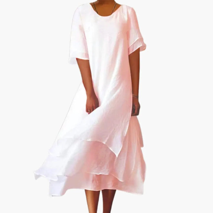 Versatile women's sleeveless midi dress, round neck, plain finish, fitted waist for an elegant summer look.