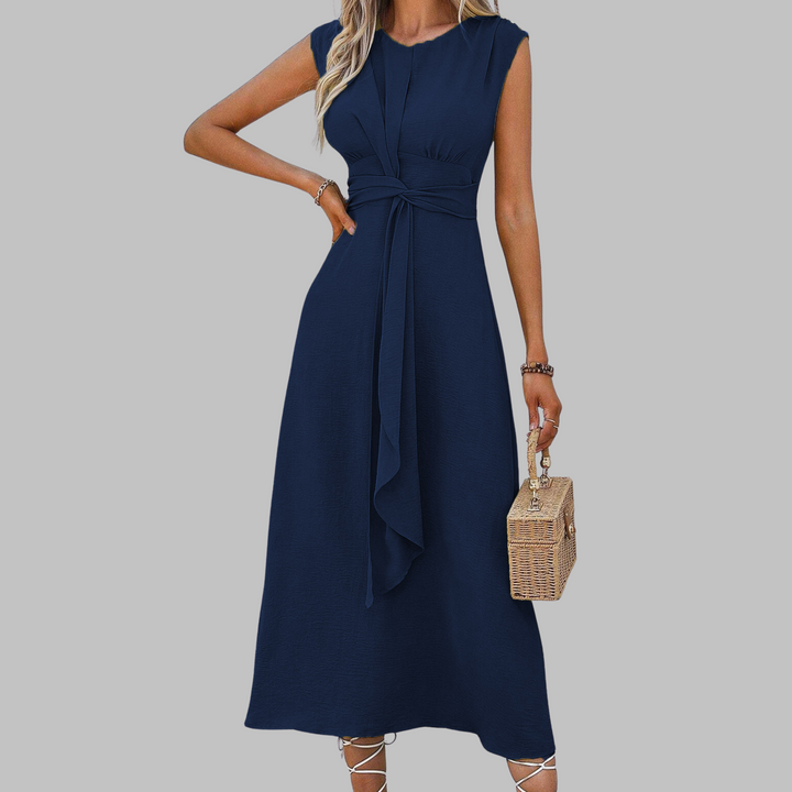 Women's elegant sleeveless round neck maxi dress, comfortable and chic for versatile wear. Flowy fabric.