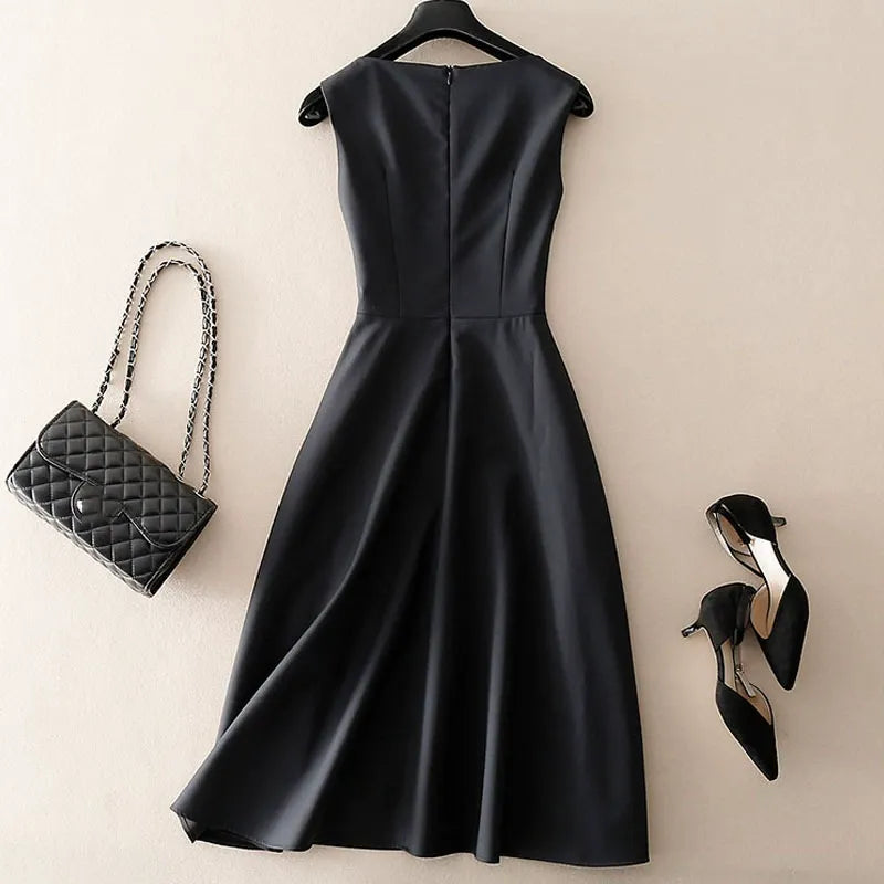 Black women's sleeveless tailored dress, a versatile and elegant piece for formal events or modern everyday fashion.