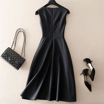 Black women's sleeveless tailored dress, a versatile and elegant piece for formal events or modern everyday fashion.