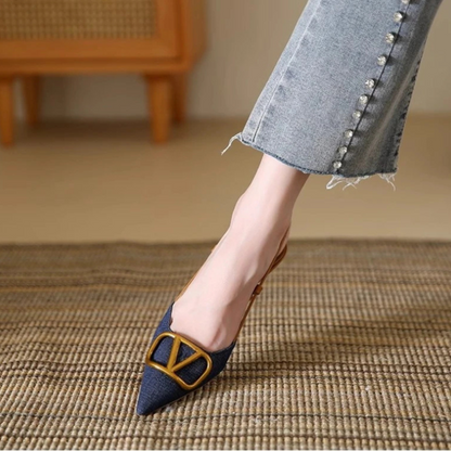 Chic women's slingback stiletto heels, featuring a sophisticated pointed toe and adjustable buckle strap.