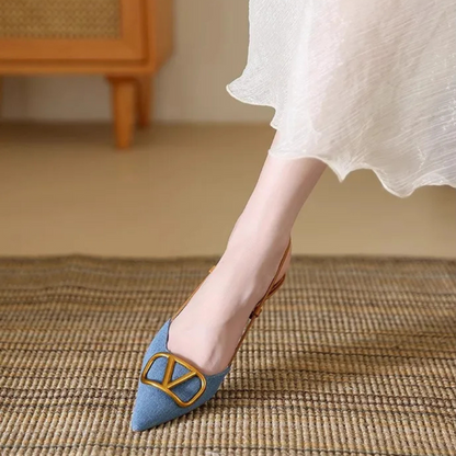 Refined women's slingback stiletto heels with an elegant pointed toe & secure, adjustable buckle detail.