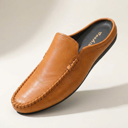 Elegant women's slip-on mules. Comfortable flat loafer style, perfect for summer casual or dressy outfits.