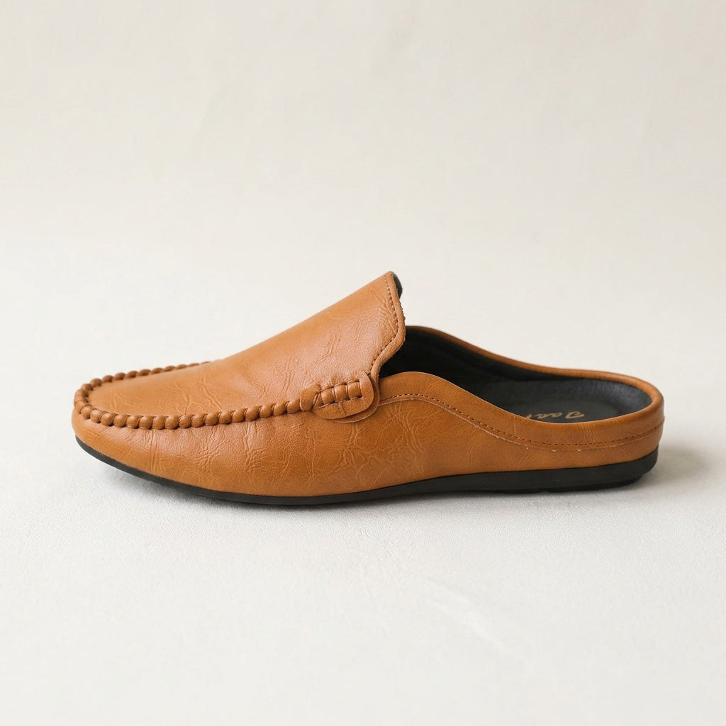 Stylish open-toe slip-on mules for women. Elegant flat loafers, ideal for summer comfort and casual wear.