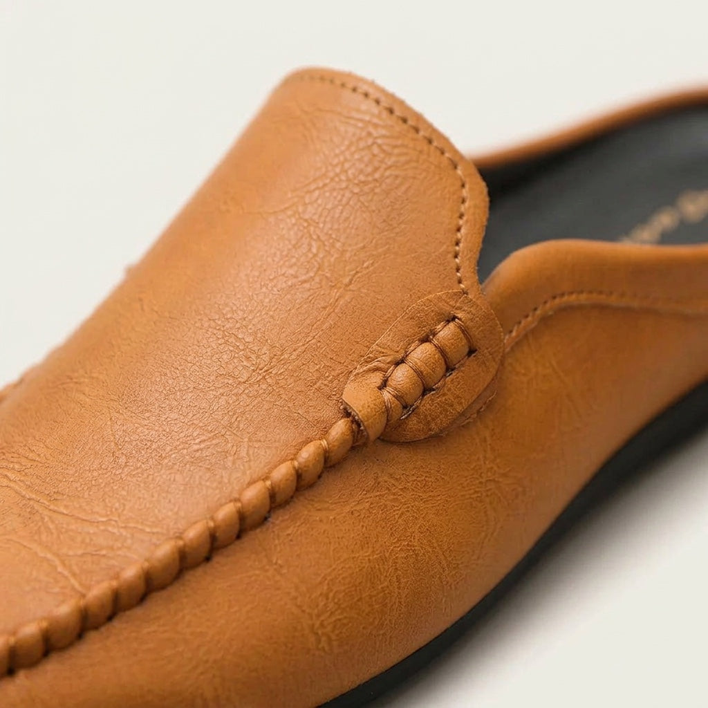 Women's comfort slip-on mules. Elegant flat loafer shoes with an open-toe design, great for summer style.