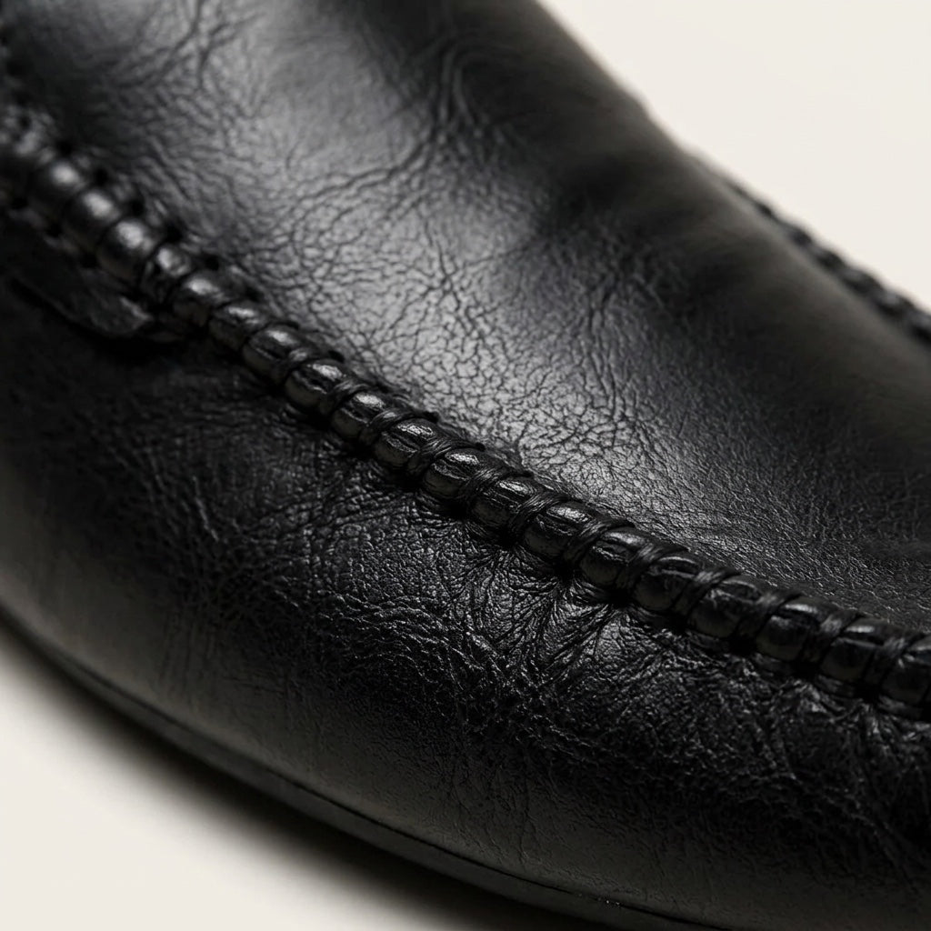 Sleek women's slip-on mules. An elegant flat loafer style offering ultimate summer comfort for any outfit.