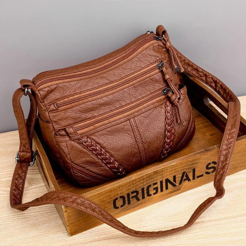 Elegant women's soft leather crossbody bag, perfect as a stylish daily shoulder bag or fashion accessory.