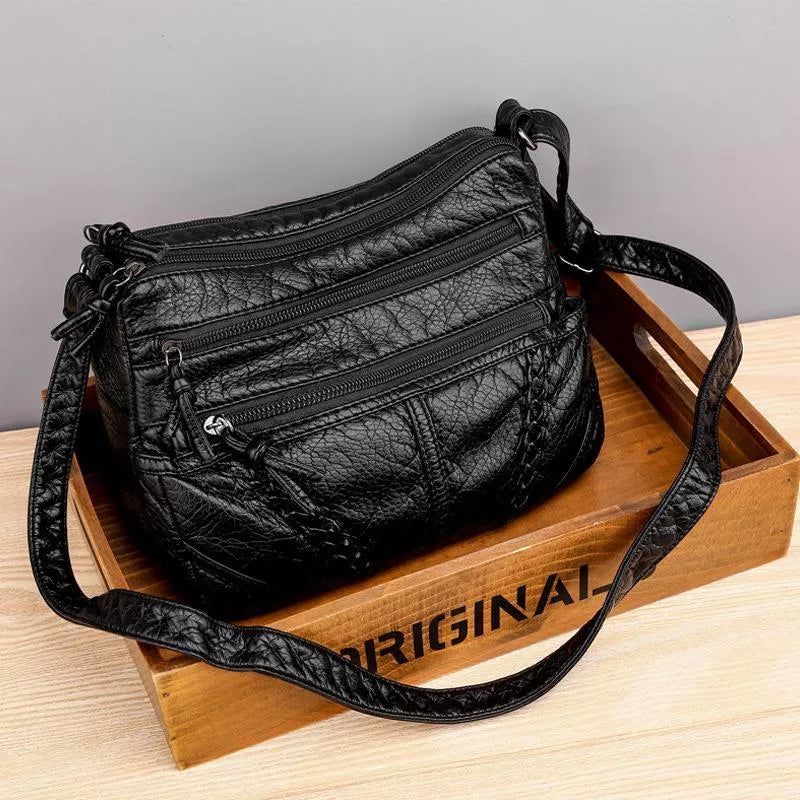 Stylish soft leather women's handbag, a versatile crossbody & shoulder bag for elegant daily fashion.