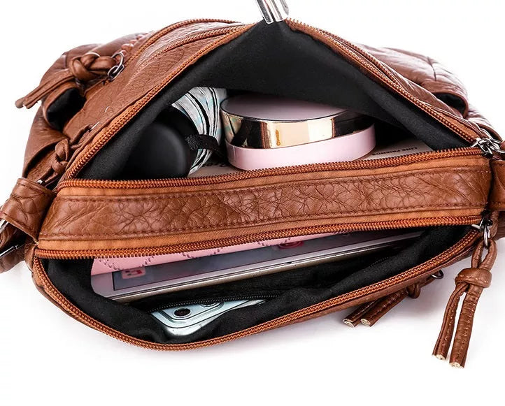 Luxurious soft leather crossbody bag for women, a chic and elegant daily fashion accessory.