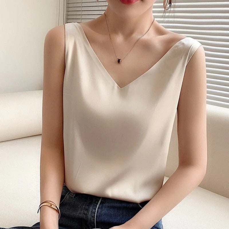 Elegant women's soft silk tank top in a smooth finish, perfect for sophisticated summer wear.