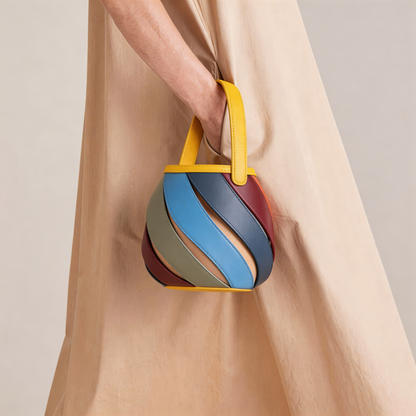 Versatile women's elegant spiral cage bucket bag, unique top-handle handbag, a chic fashion accessory.